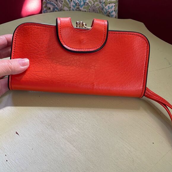 Vintage Handbags - Vintage 1960’s70’s orange faux leather wristlet.